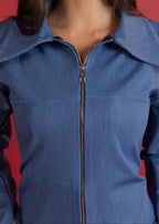 Blue denim jacket with a zipper on a red background